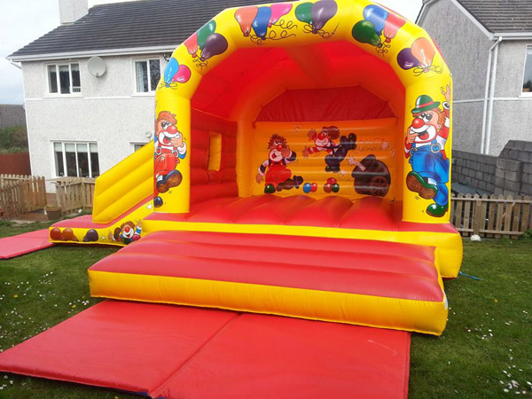 bouncy castles with slides for hire